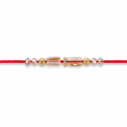 Red Thread Rakhi with Champagne Crystal Beads and Golden Accents