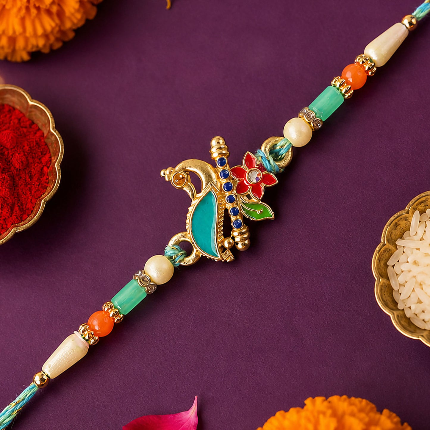 Teal Peacock Enamel Pendant Rakhi with Kundan Flower Accent