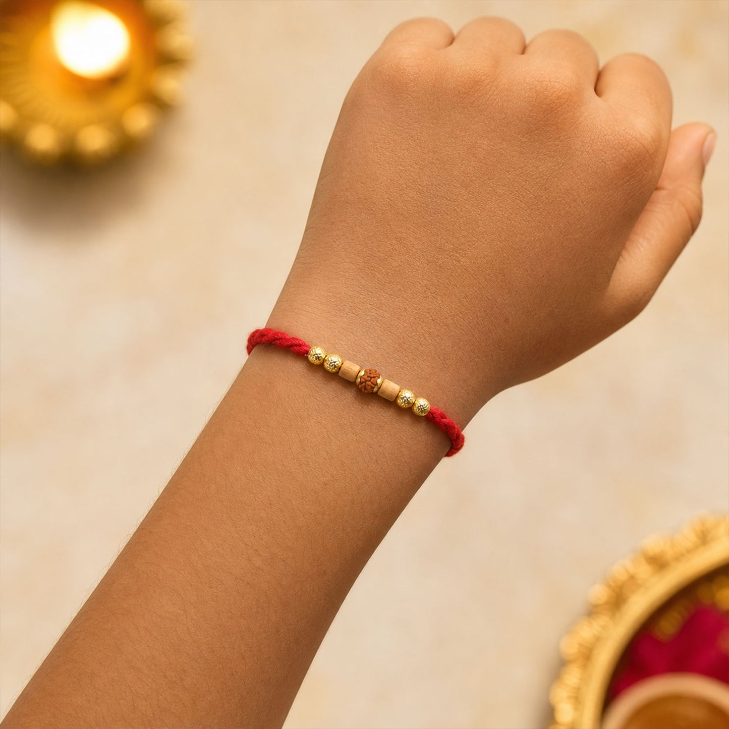 Red Cord Rakhi with Rudraksha and Natural Wooden Bead Accents