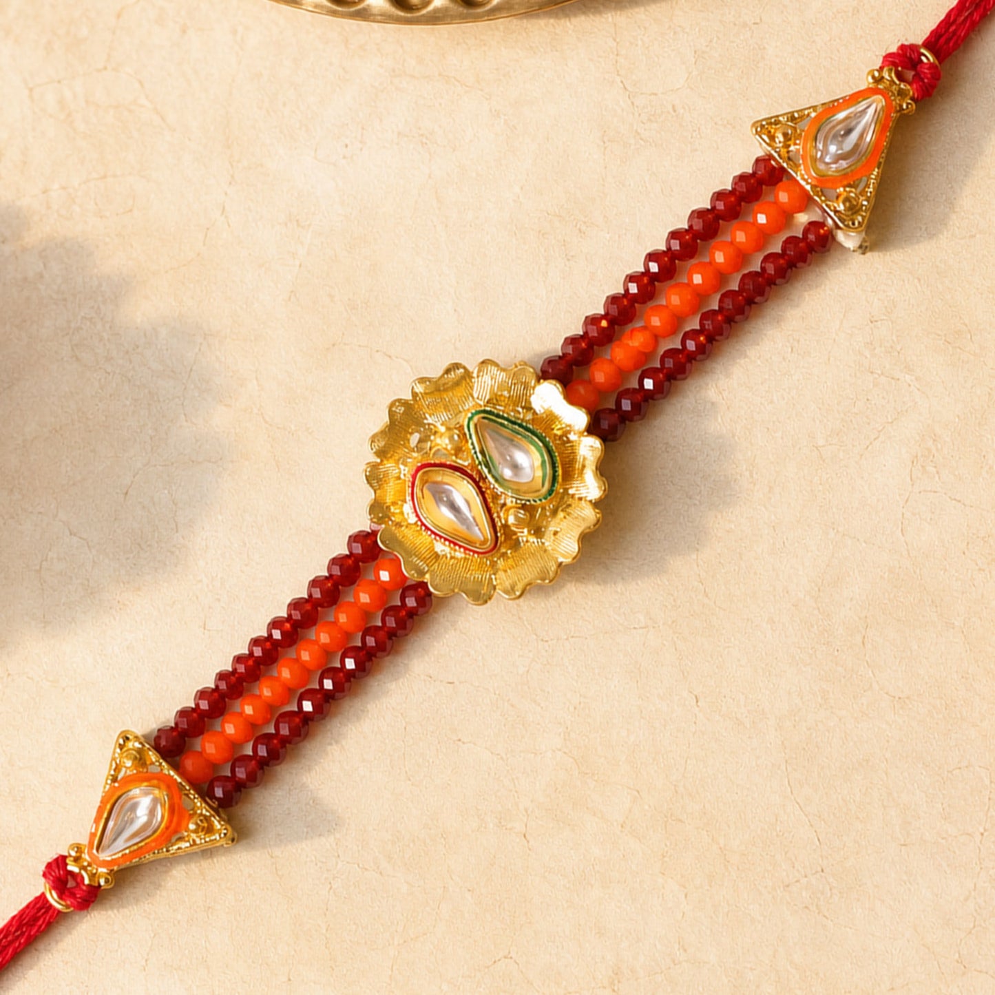 Red Beaded Floral Rakhi with Golden Center and Traditional Festive Gift Appeal Ideas