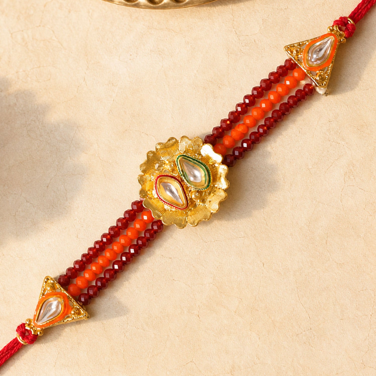 Red Beaded Floral Rakhi with Golden Center and Traditional Festive Gift Appeal Ideas