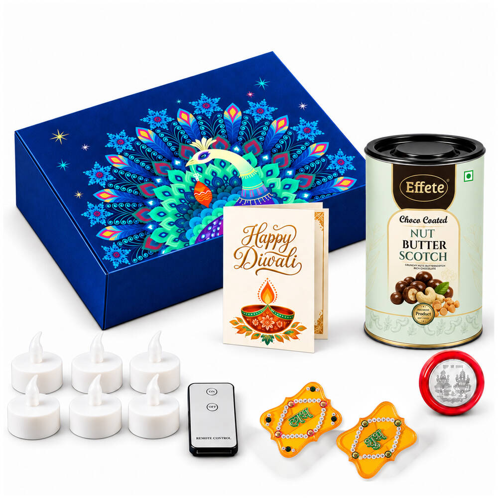 A vibrant blue box featuring a peacock design, a tin of nut butterscotch, a Diwali card, LED tealights, and two Shubh-Labh