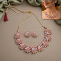 Jewellery – Vibrant floral necklace and earrings set in gold finish