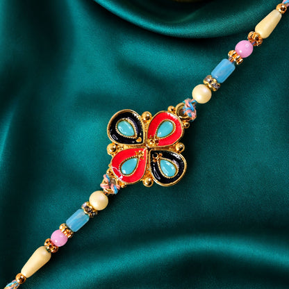 Four-Petal Floral Rakhi with Cream Thread, Multicolor Enamel and Floral Motif Design