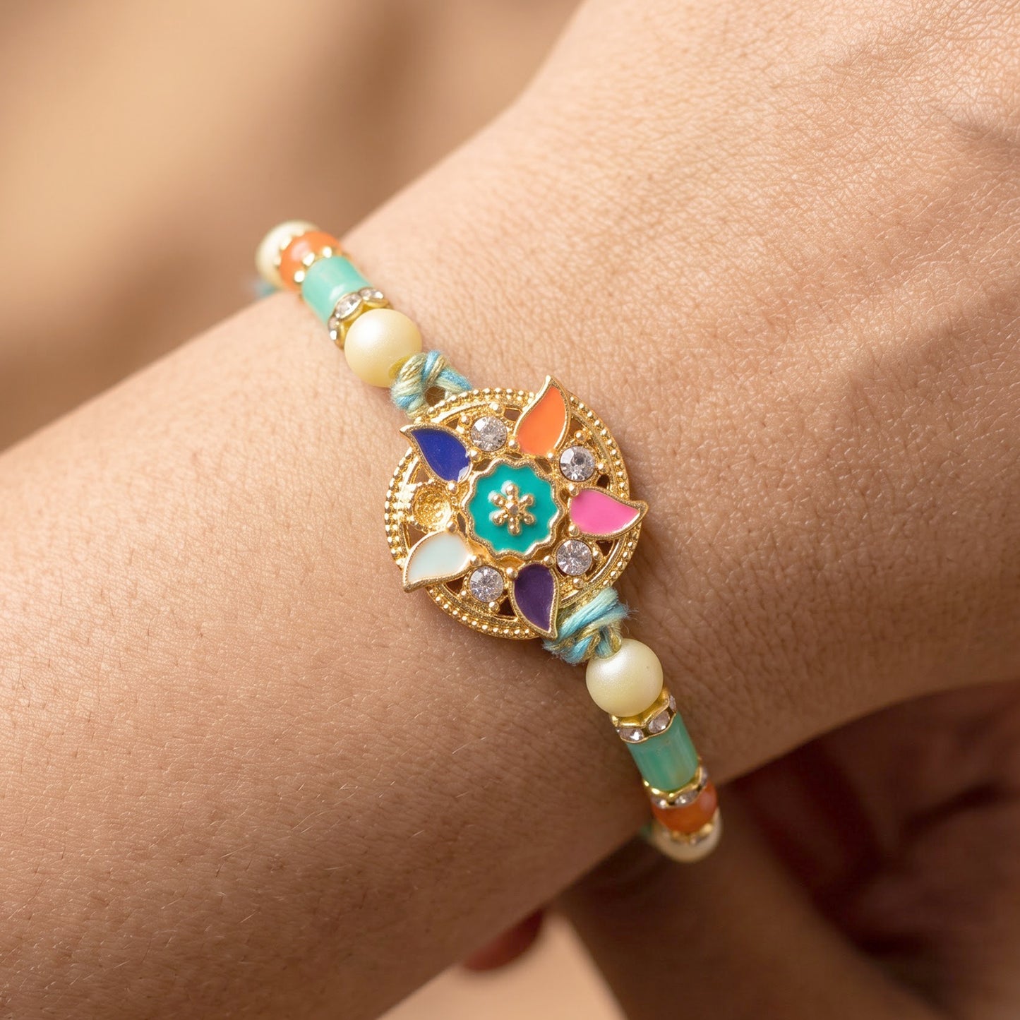 Multicolor Floral Kundan Pendant Rakhi with Pearl and Orange Beads