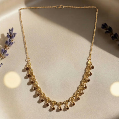 Gold Tone Beaded Drop Necklace with Elegant Fringe Design