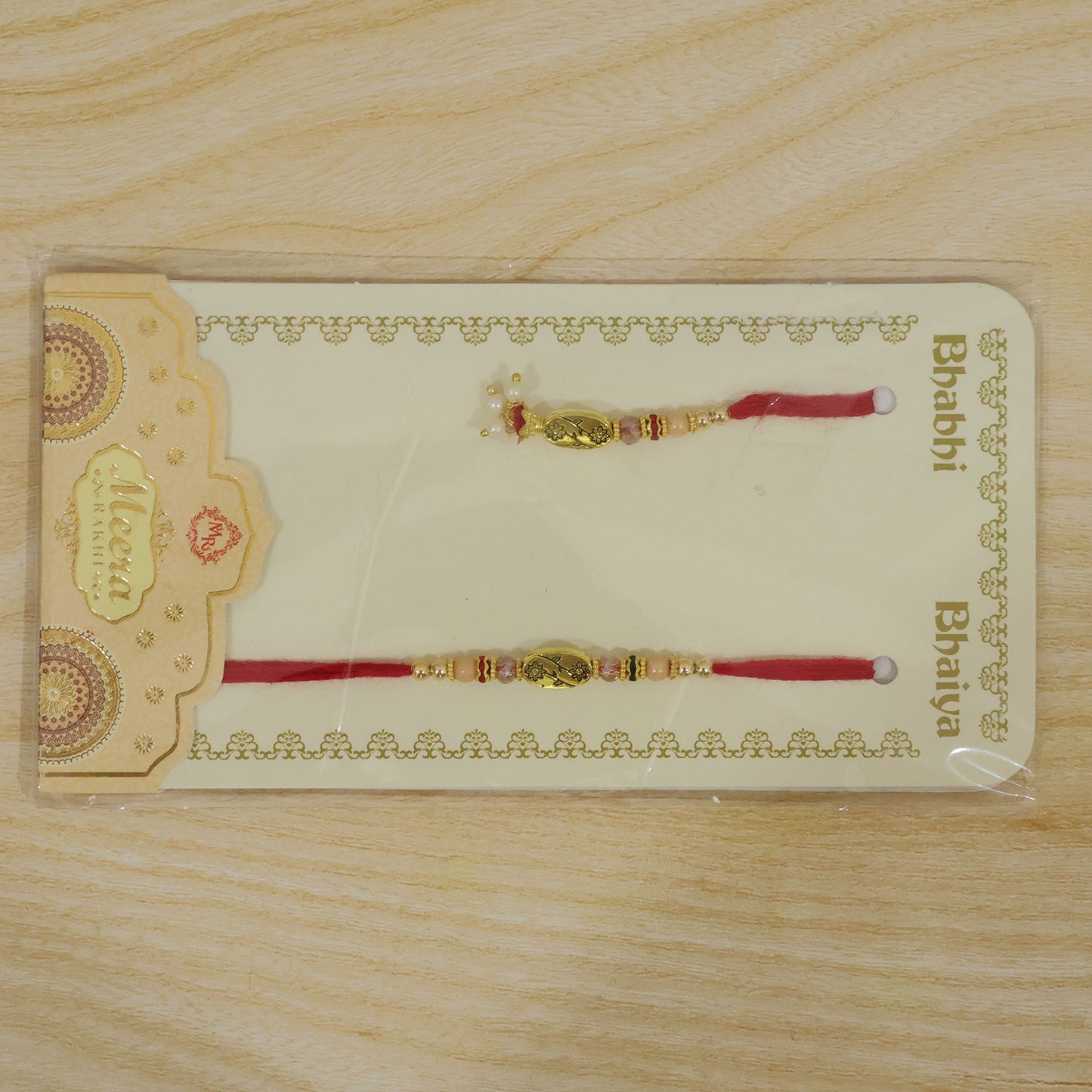 Circular Medallion Bhai Bhabhi Rakhi with Oval Medallion and Floral Tassel for Gift