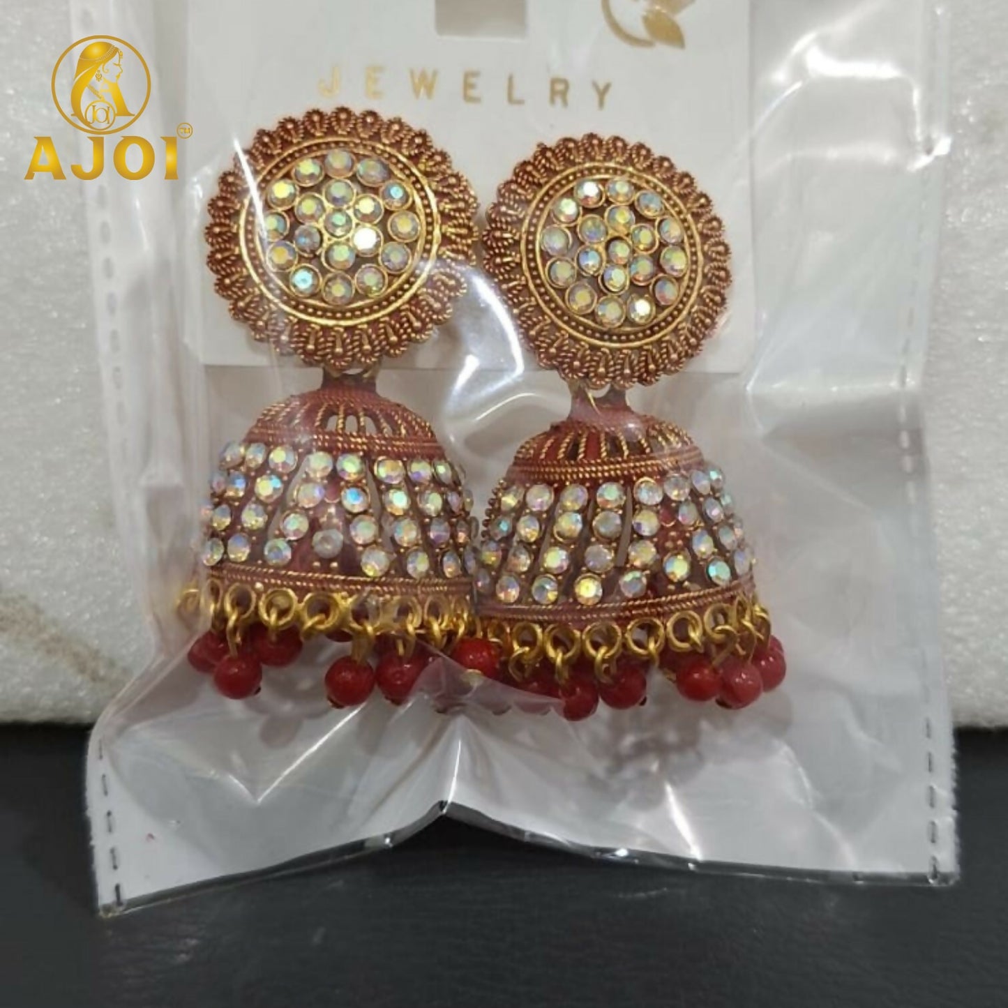 Elegant Gold-Plated Pearl Jhumka Earrings with Red Bead Drops