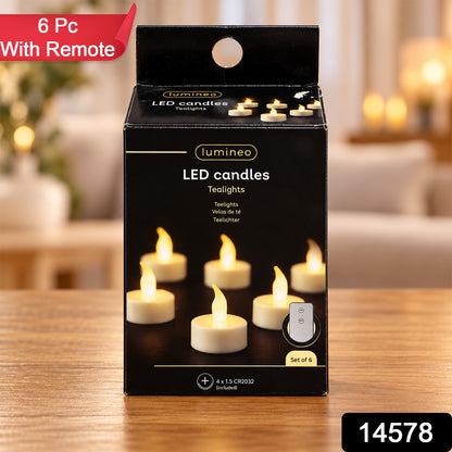Six white LED tealights with flickering flames and a remote control in a black box with a red banner.
