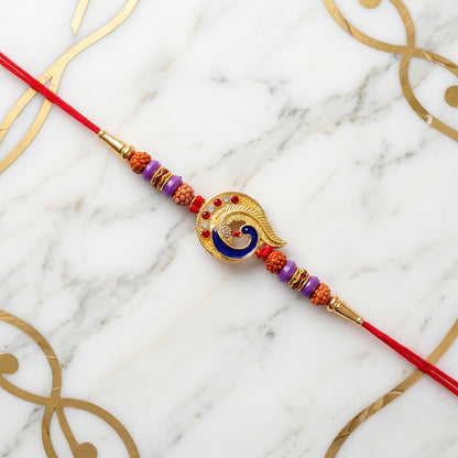 Blue Peacock Rakhi with Purple Beads and Crescent Gold Frame