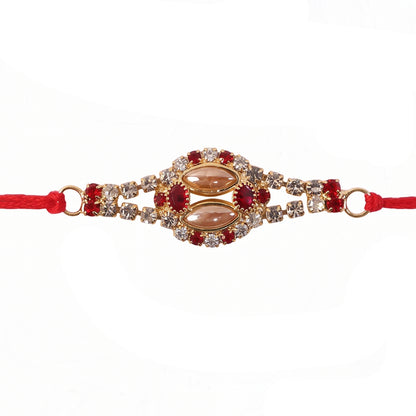 Oval Kundan Bracelet Rakhi with Red Blue Stones and Crystal Line