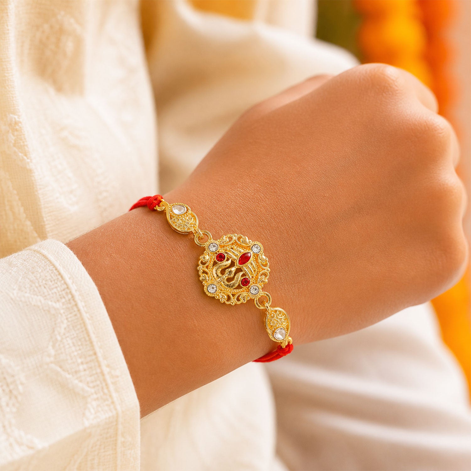 Festive Rakhi featuring Ornate Floral Medallion, pearl accents and bead line for Gift