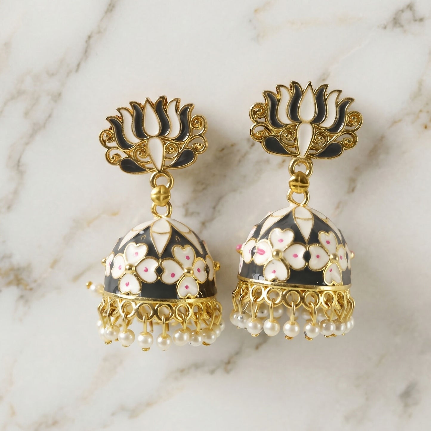 Grey lotus jhumka earrings worn with ethnic attire