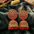Antique Gold Red Stone Jhumka Earrings – Elegant Traditional Jewelry