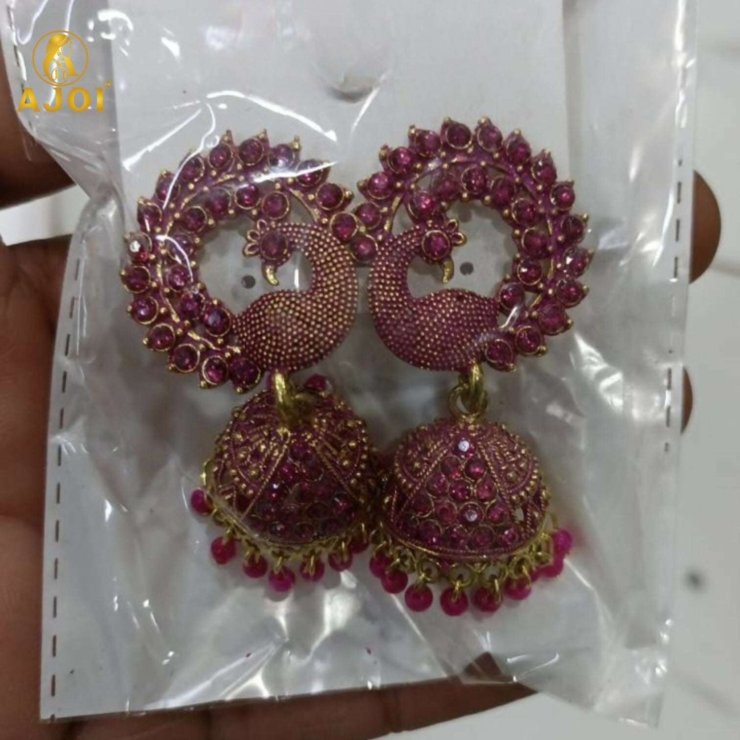 Peacock Motif Ruby-Tone Jhumka Earrings in Antique Gold Finish