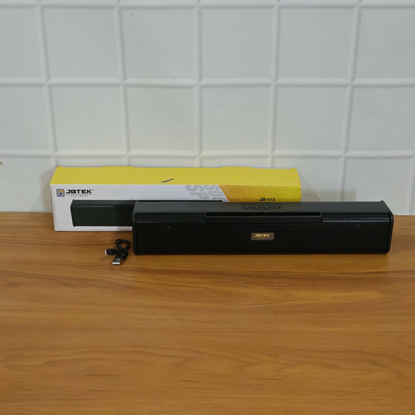 Stylish Bluetooth speaker with mobile stand.