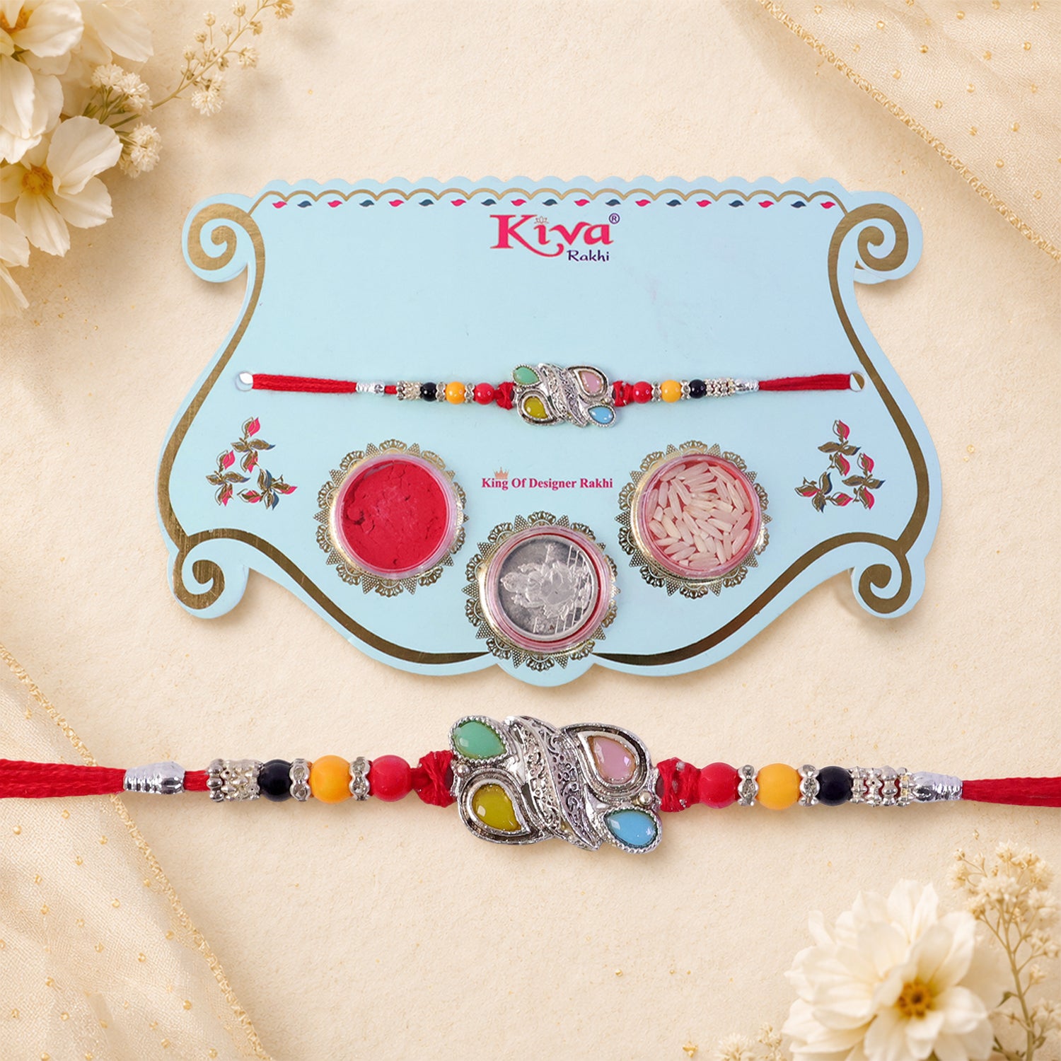 Silver Butterfly Leaf Rakhi with Pastel Stones, Roli Chawal Coin and Card Packing