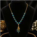 Beaded Y Necklace with Cascading Chain Fringe Pendant and Faceted Round Bead Detailing