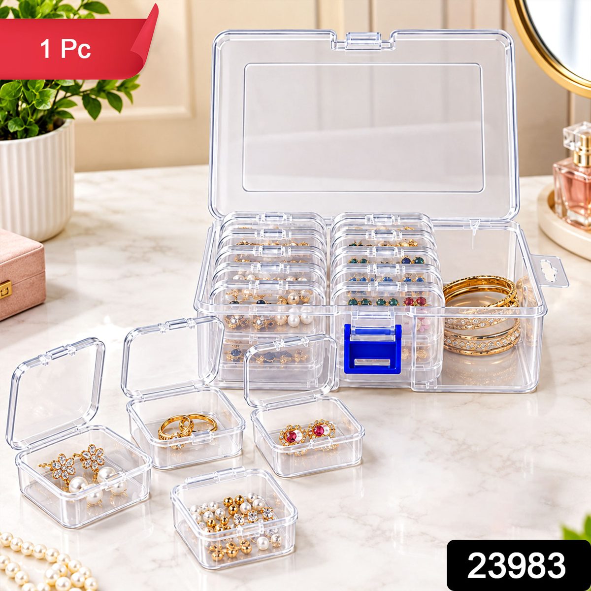 A clear plastic storage box with an open lid, revealing multiple small cases filled with various jewelry items. A – view 8