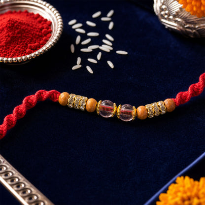 Red Braided Rakhi with Crystal and Natural Wooden Bead Accents