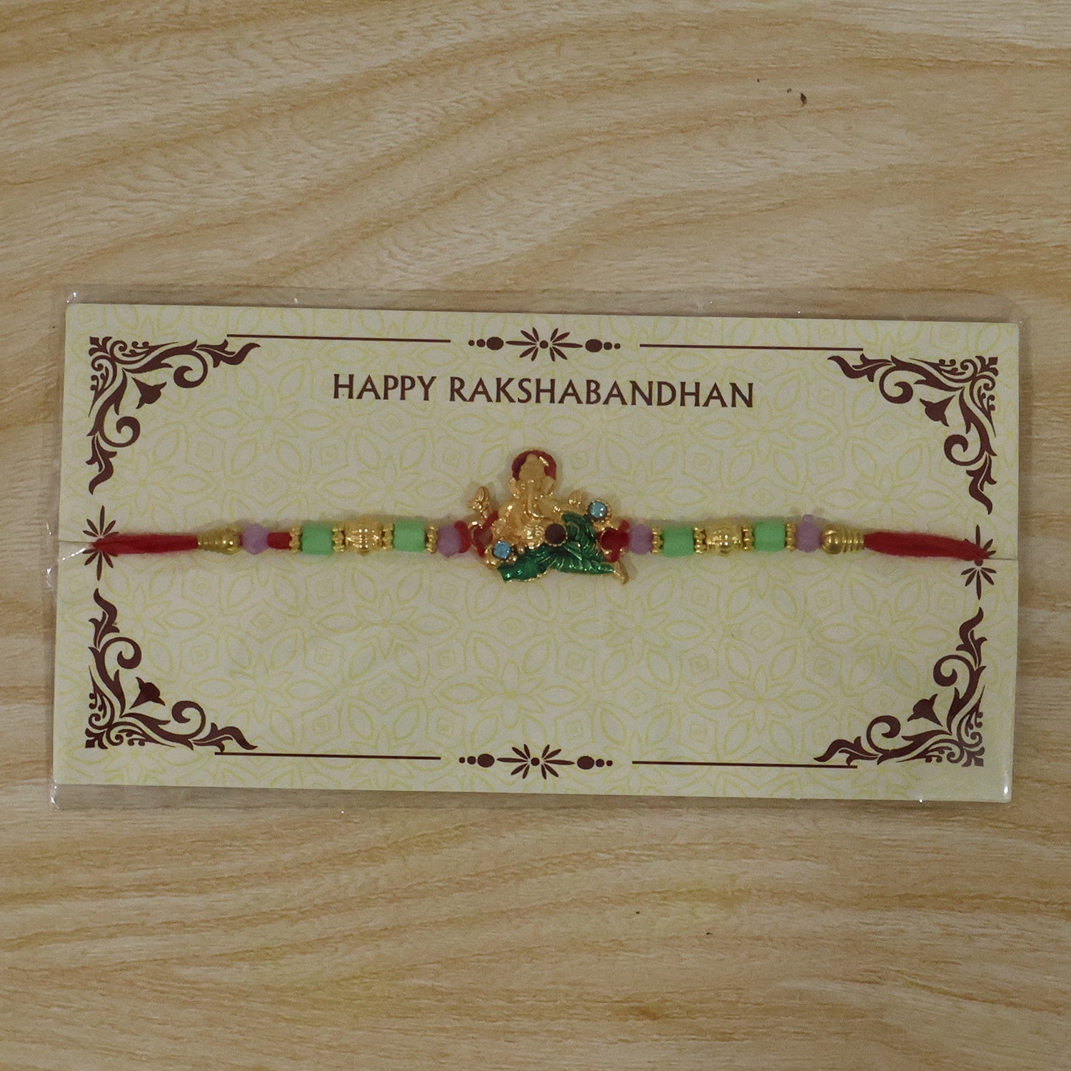 Lord Ganesha on Leaf Designer Rakhi