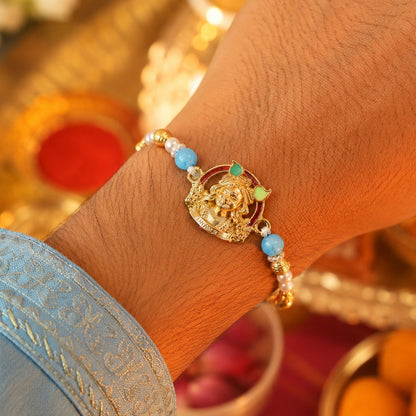 Gold-Toned Khatu Shyam Rakhi with Blue and Pearl Beads for Raksha Bandhan (5pcs)