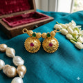 Floral Kudasan Gold Pendant with Ruby Centers & Textured Beads