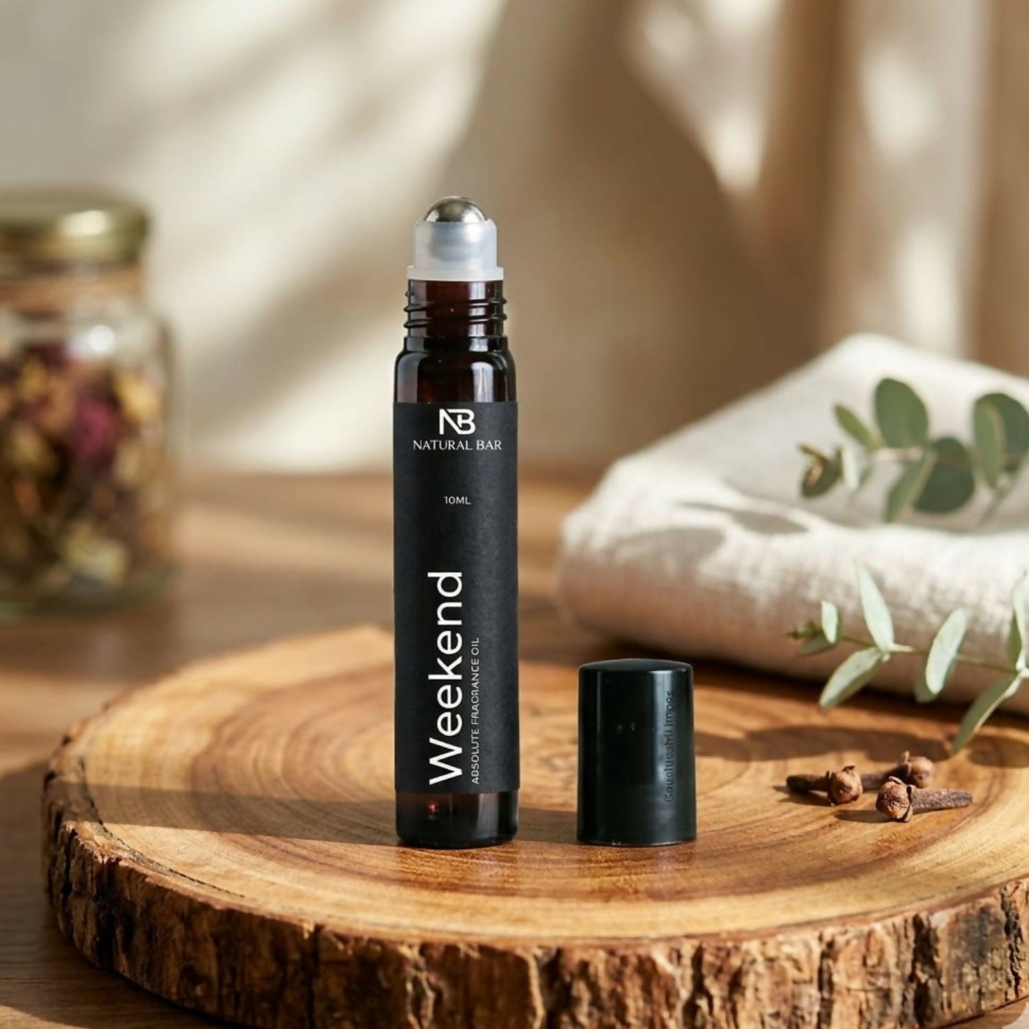Weekend Luxury Attar Roll On in 10ml bottle showcasing natural perfume oil application