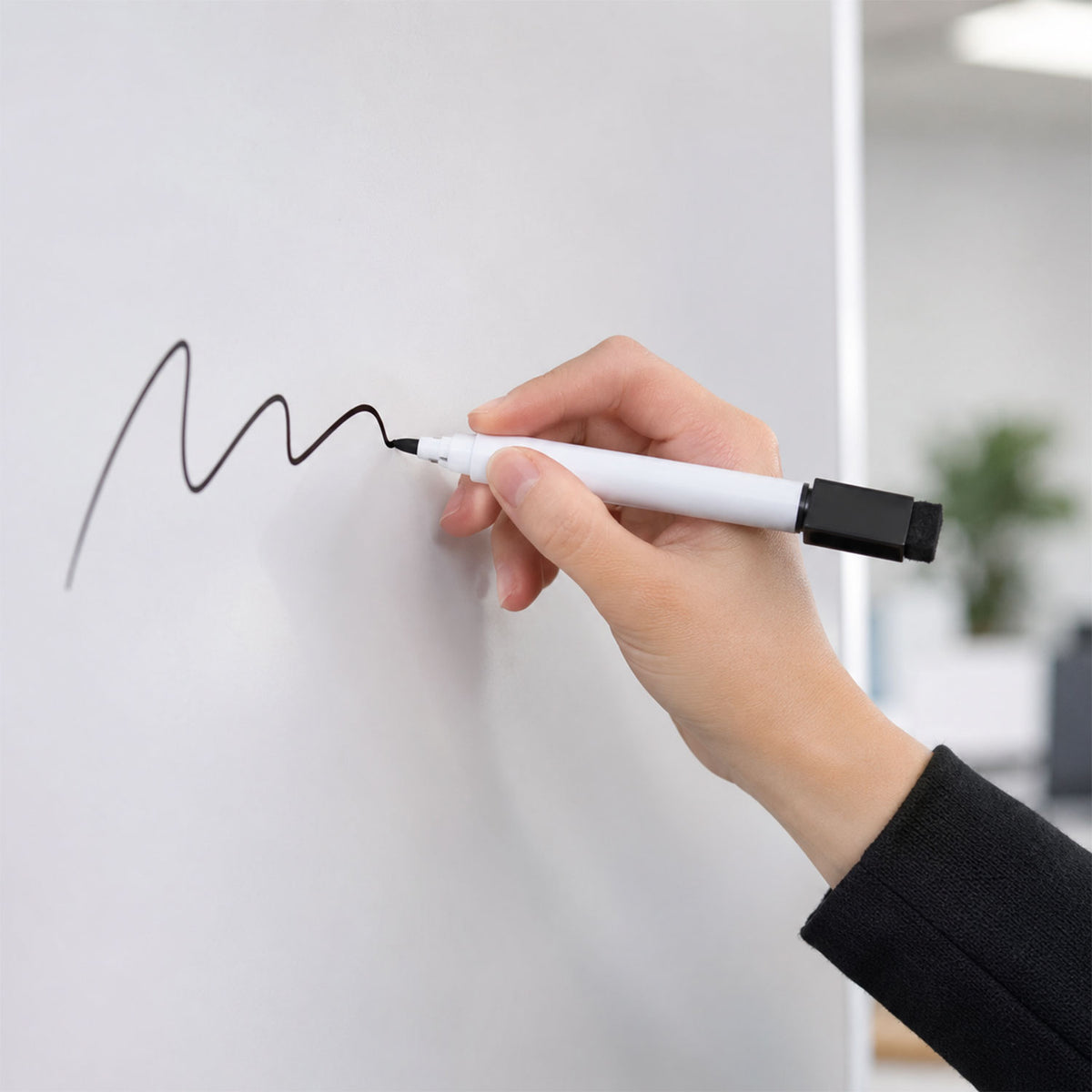Side view of whiteboard marker with eraser end and slim profile