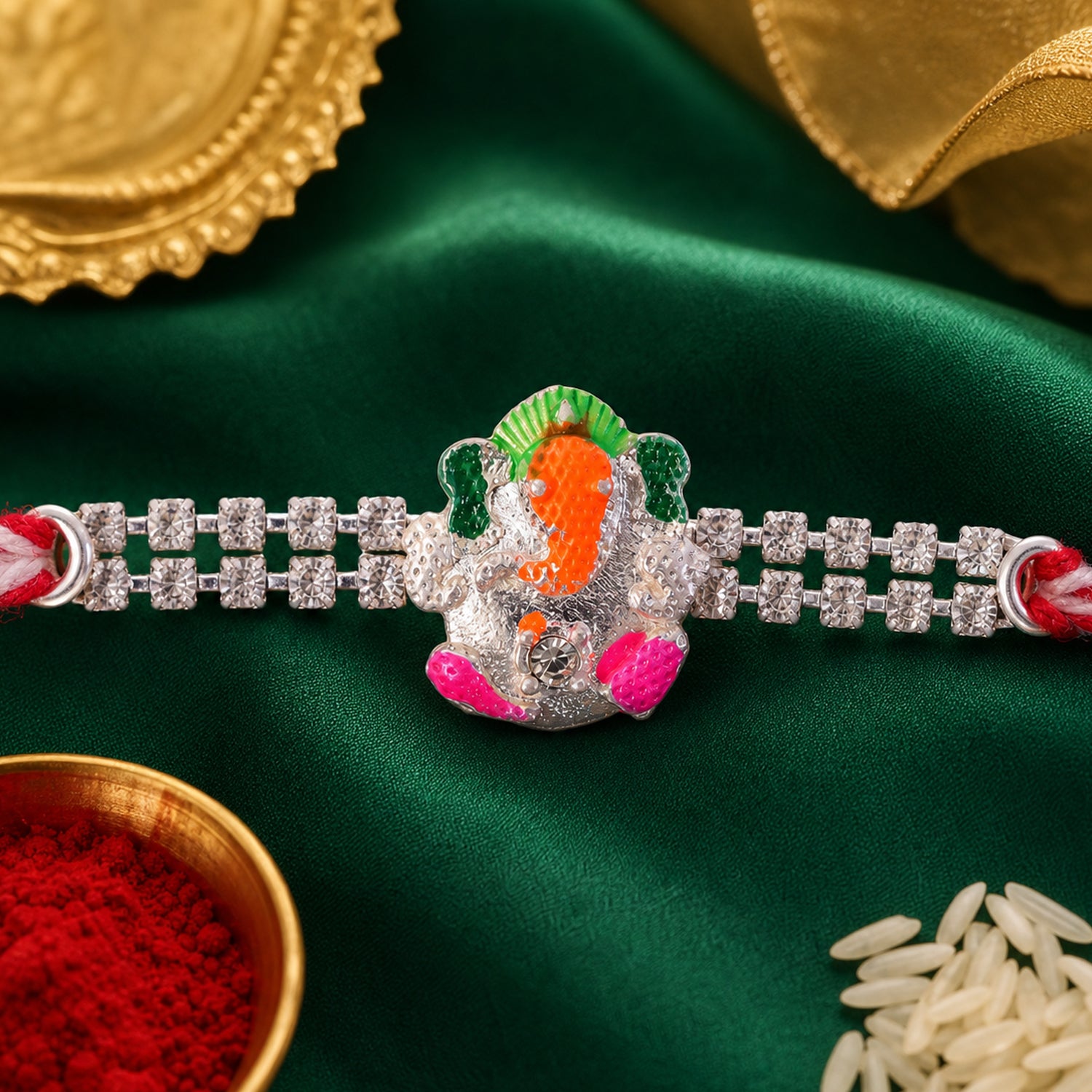 Elegant Rakhi featuring Ganesha Charm, crystal accents and thread style for Gift Use