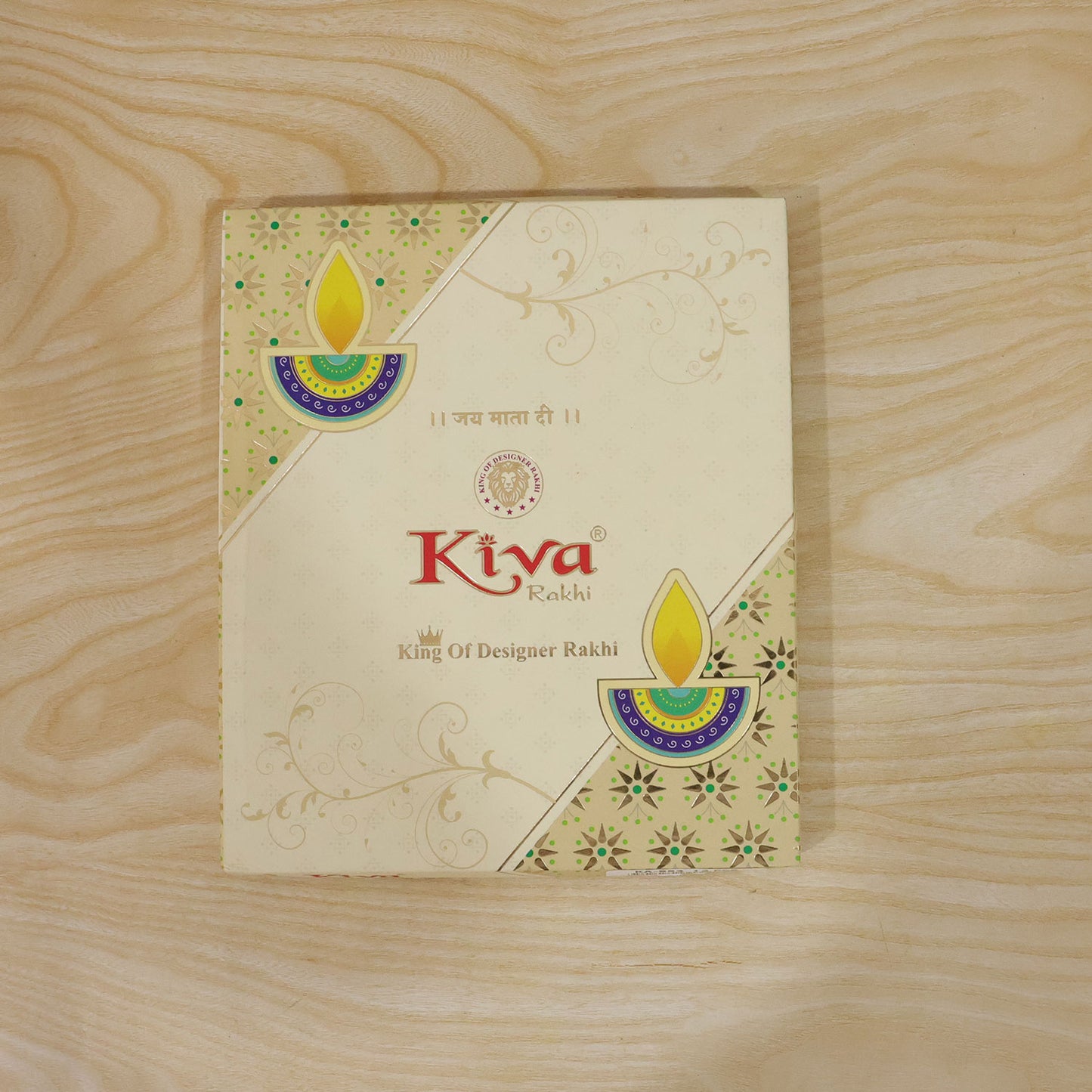 Antique Gold Teardrop Designer Rakhi with Red Stone, Roli Chawal Coin and Diya Gift Packing