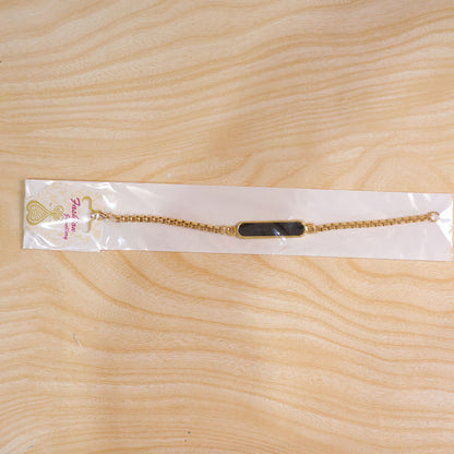 The personalized name bracelet presented in its premium gift packaging.