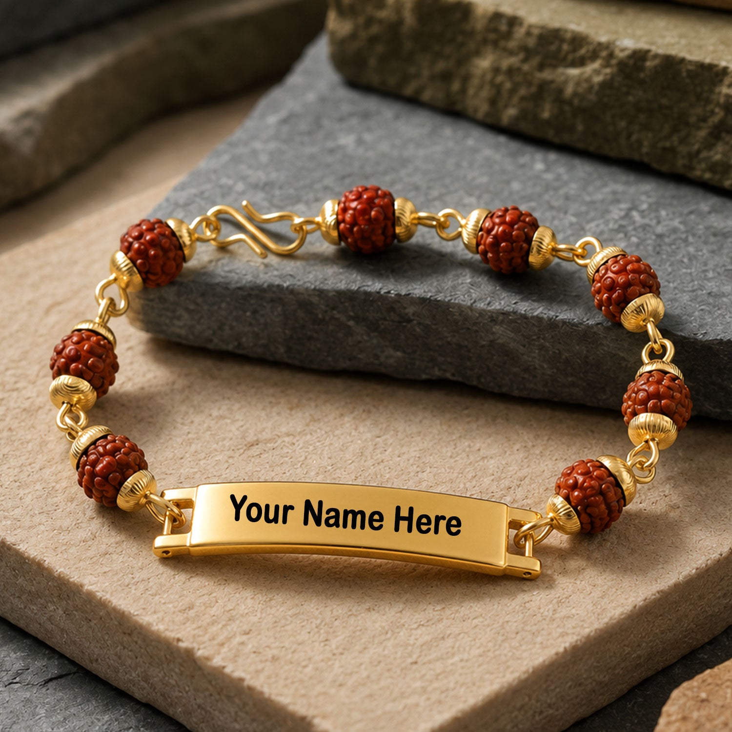 Man wearing a personalised gold plated name bracelet on his wrist, highlighting its comfortable fit.