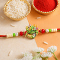 Devotional Rakhi for Brother – Floral Kalash Design 12 Pack