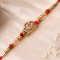 Om and Flute Pendant Rakhi with Rudraksha Beads