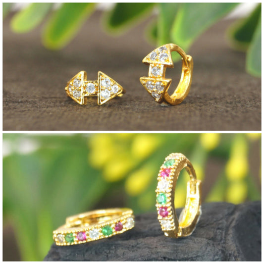 Front view of gold plated floral cluster huggie hoop earrings showcasing CZ stones