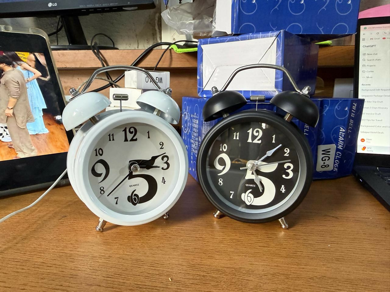 Twin bell alarm clock on study table with vintage design