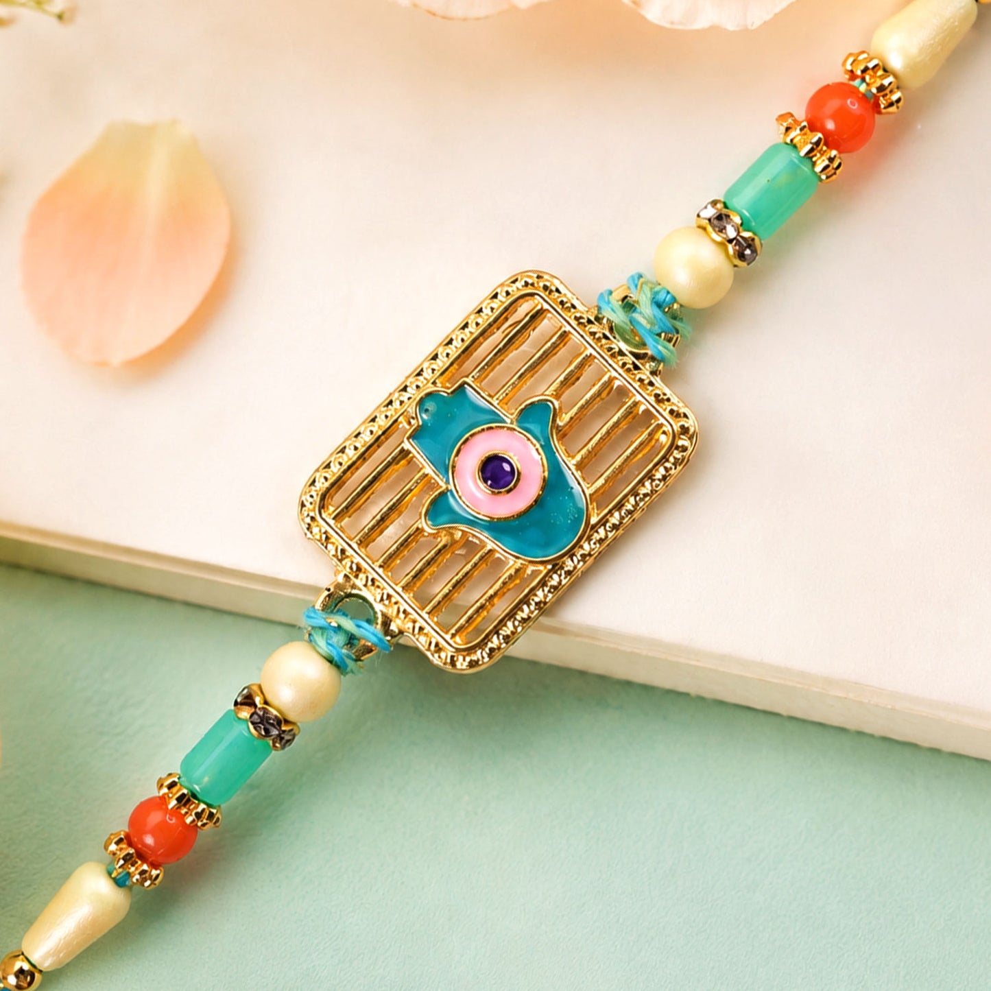Evil Eye Square Charm Rakhi with Turquoise Beads and Modern Festive Gift Style Ideas