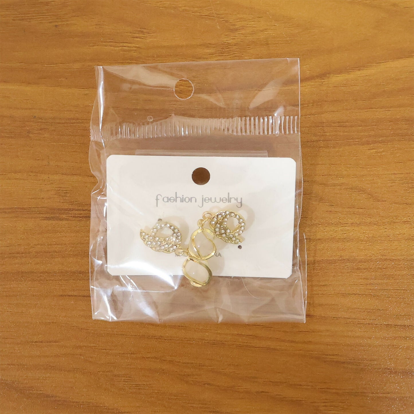 Pair of crystal swan earrings showing unique design and finish