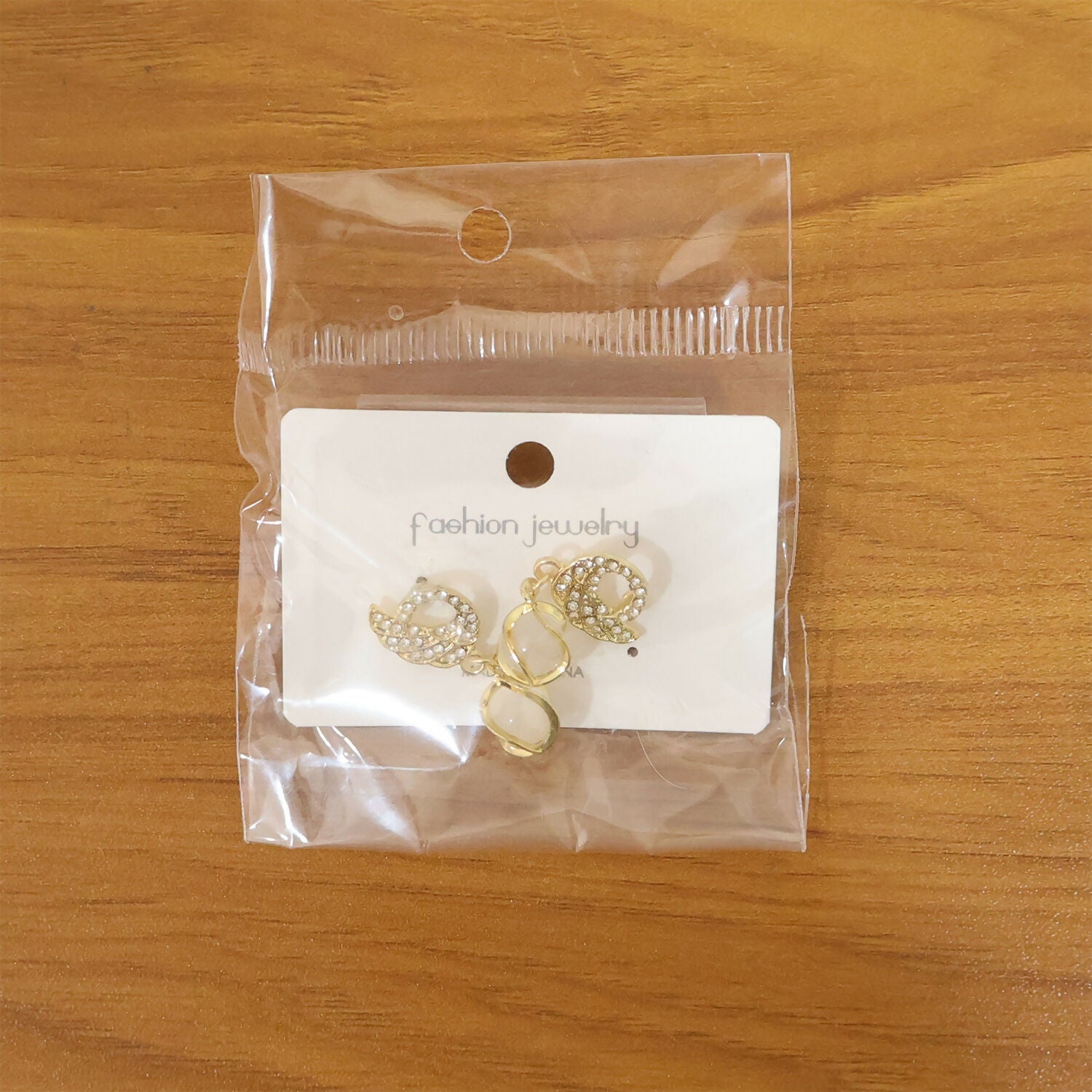 Pair of crystal swan earrings showing unique design and finish