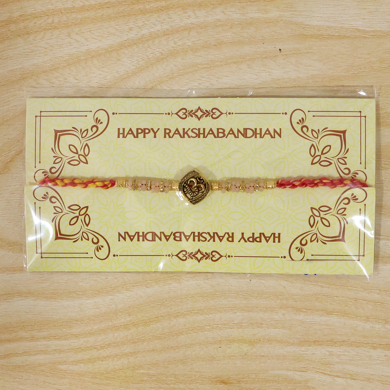 Silver Tone Designer Rakhi with Pastel Beads and Elegant Bracelet Style Finish