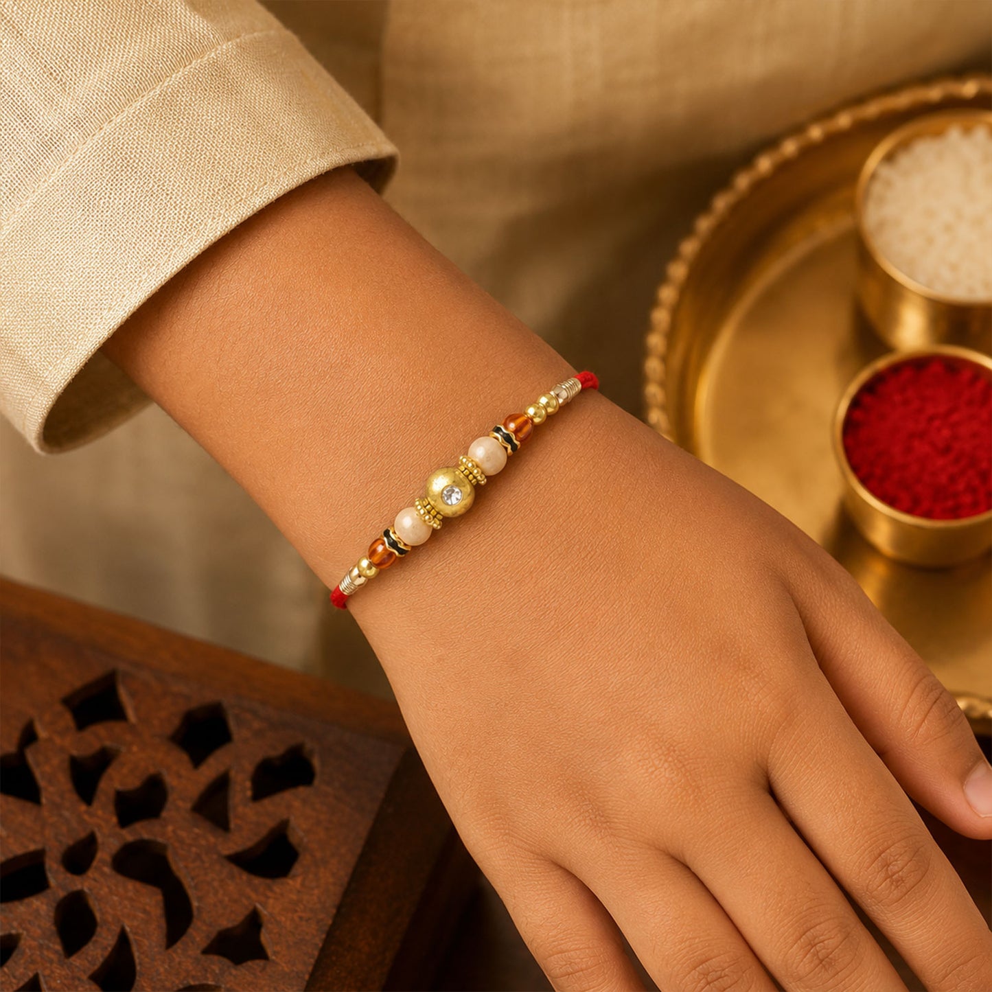 Couple Rakhi Hanging Pair with Pearl Drops, Gold Accents and Beaded Layers