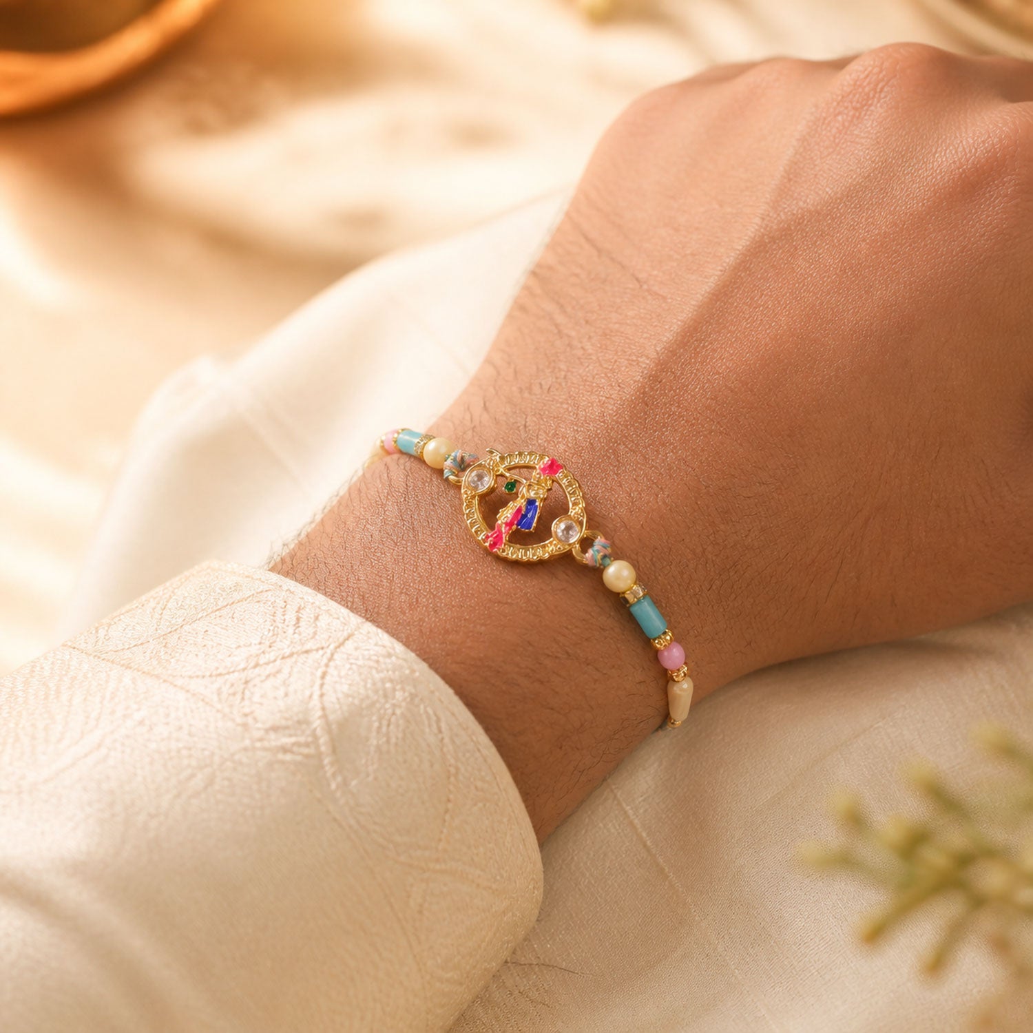 Colorful Circular Charm Rakhi with Pink Blue Beads and Festive Brother Gift Appeal