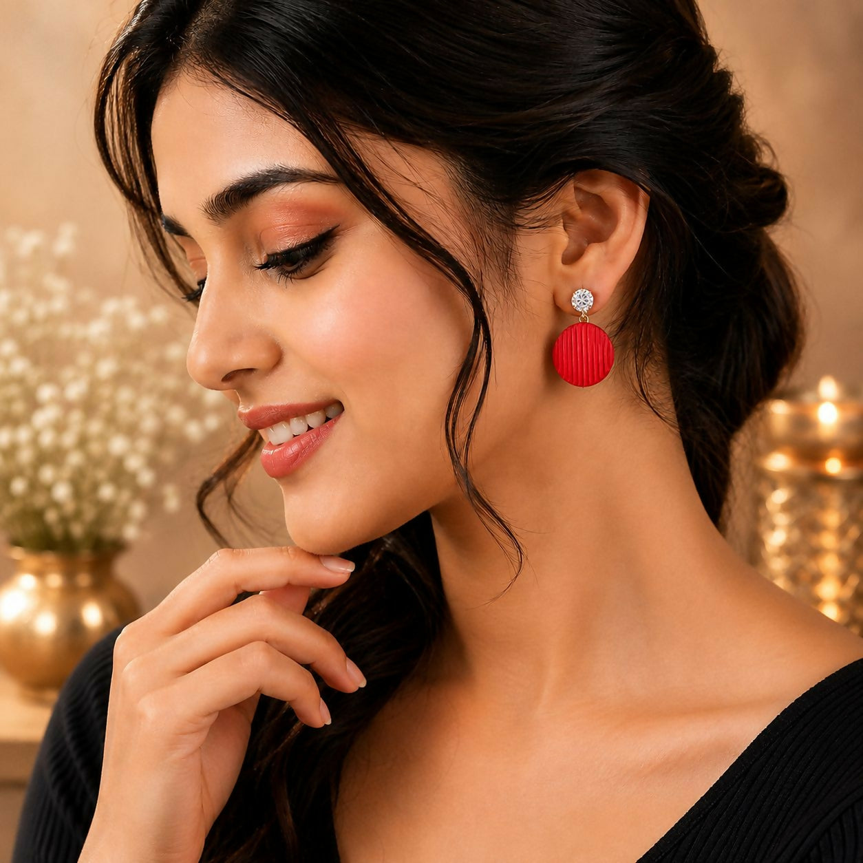 Detail shot of several colorful drop earrings, emphasizing the intricate designs and sparkling crystal elements.