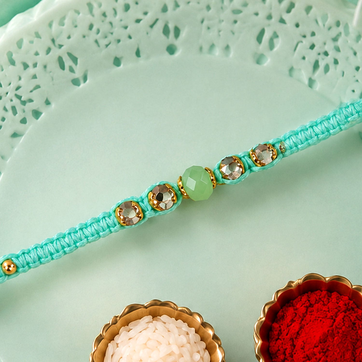 Beautiful Pearl and Stone Rakhi with Bright Beads and Elegant Raksha Bandhan Look