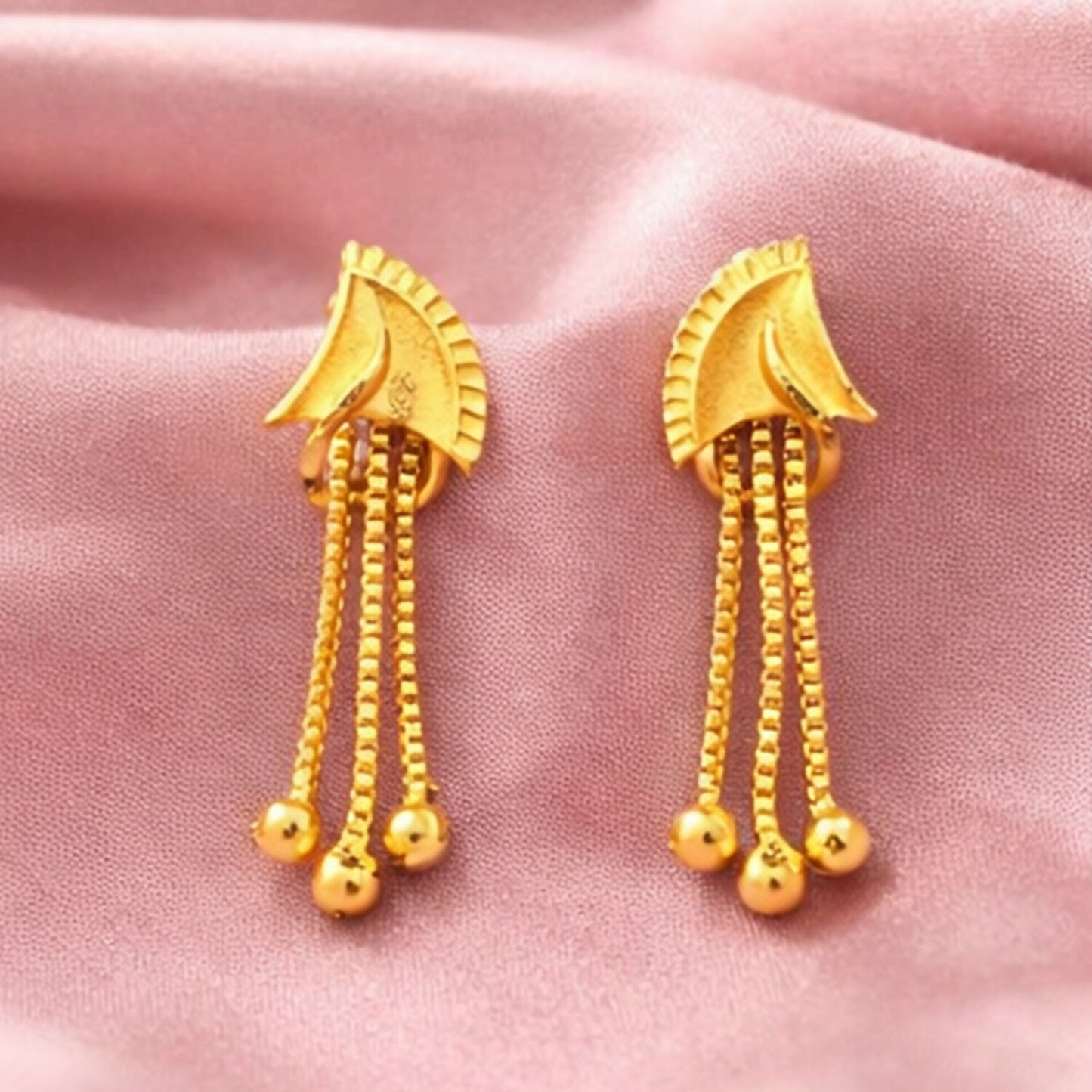 Elegant golden drop earrings with shiny stone center for women