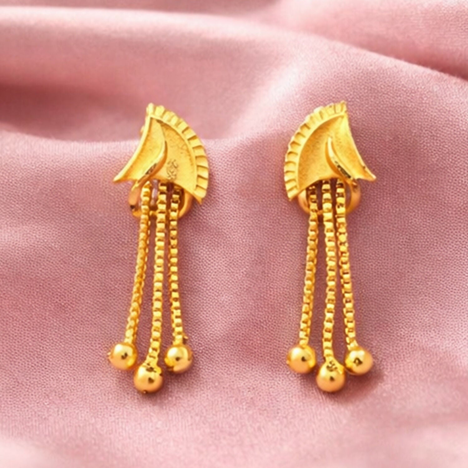 Elegant golden drop earrings with shiny stone center for women
