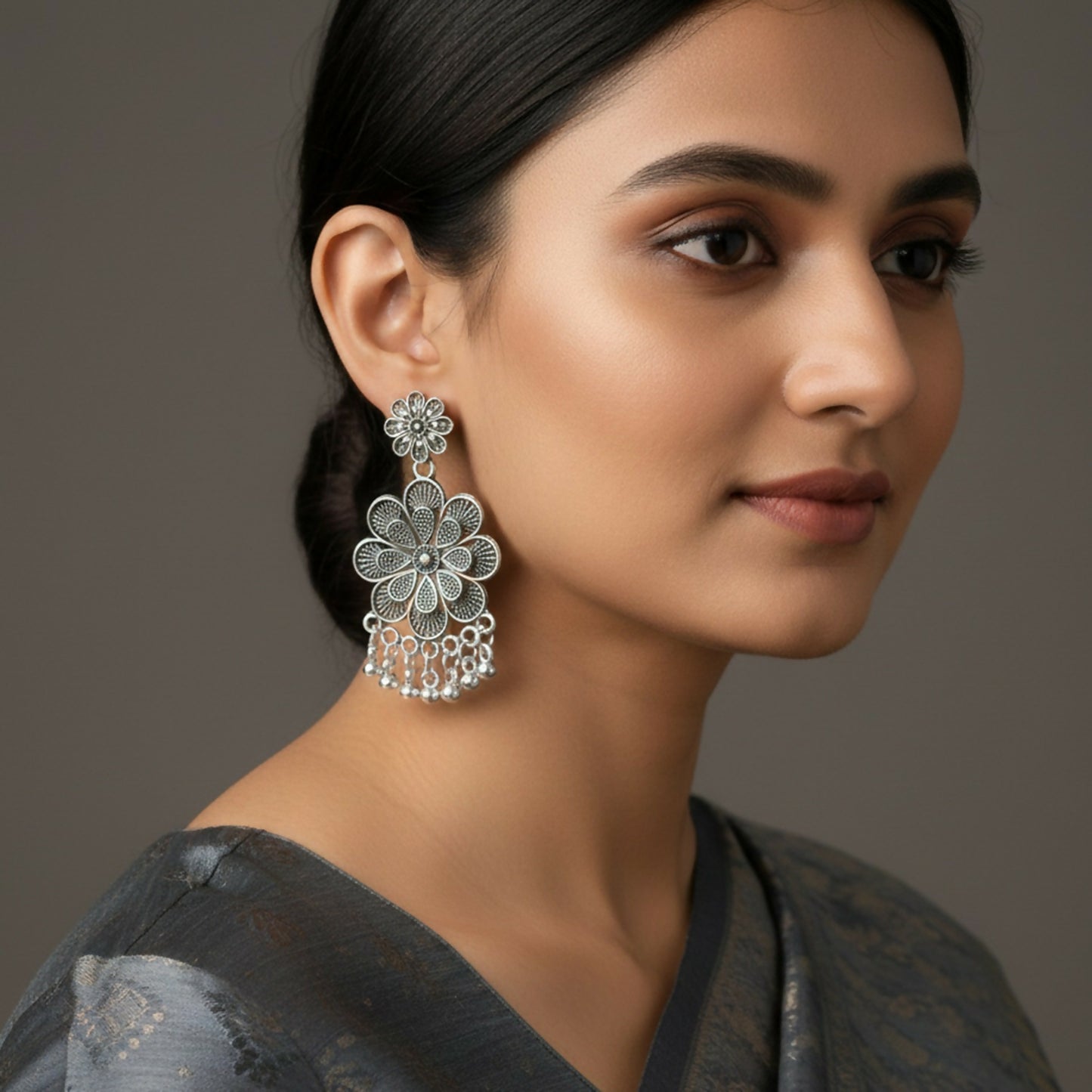 Elegant Oxidised Silver Jhumka Earings With Layered Floral Design