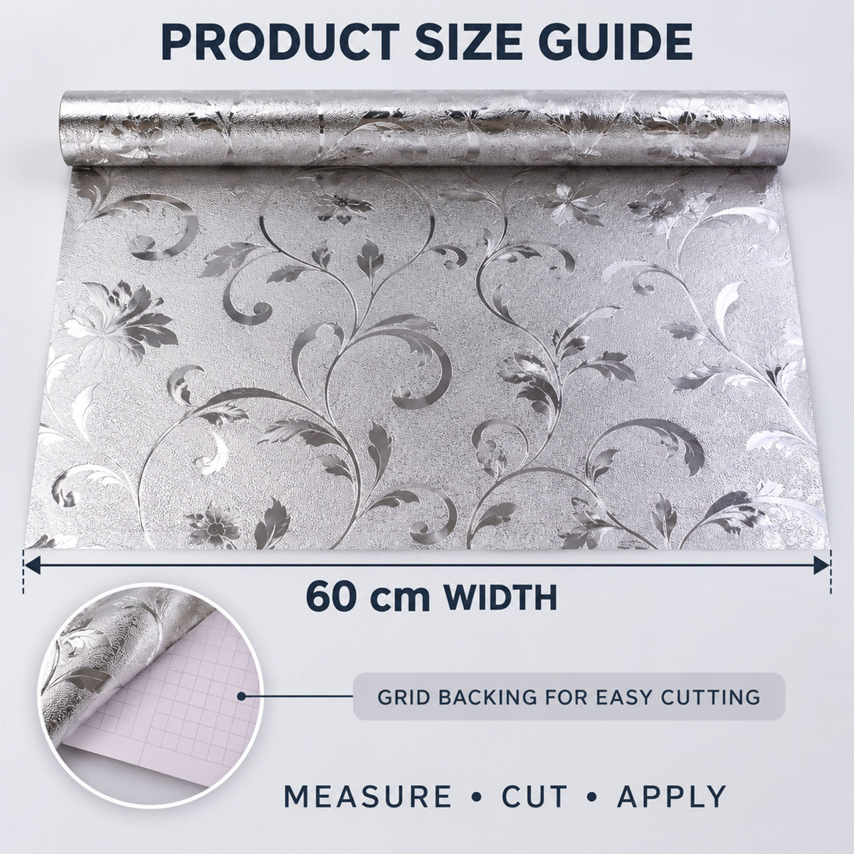 Unrolled silver floral wallpaper displaying a 60 cm width measurement and a close-up of the grid backing for cutting.