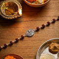 Shree Krishna Silver Rakhi with Natural Rudraksha Beads
